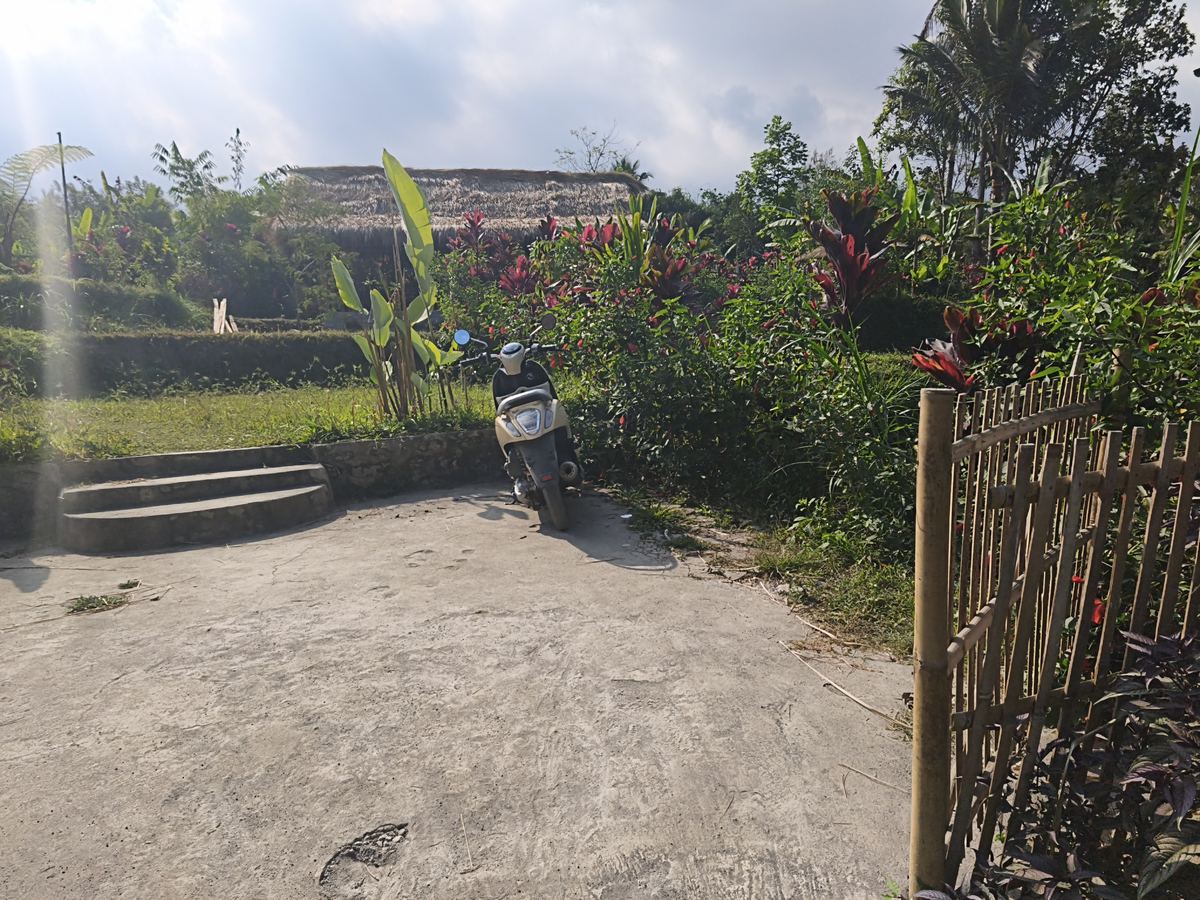 A scooter parked at the bungalows