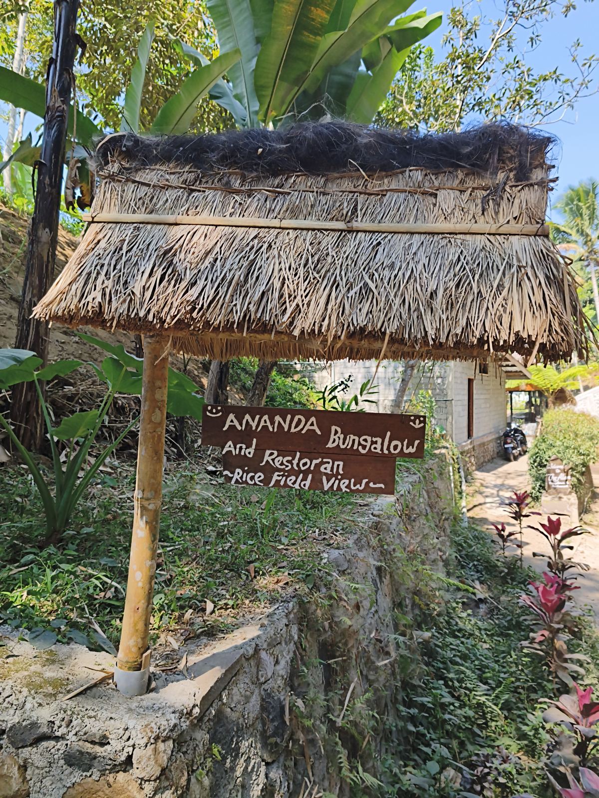 The hand-painted sign at the turn-off